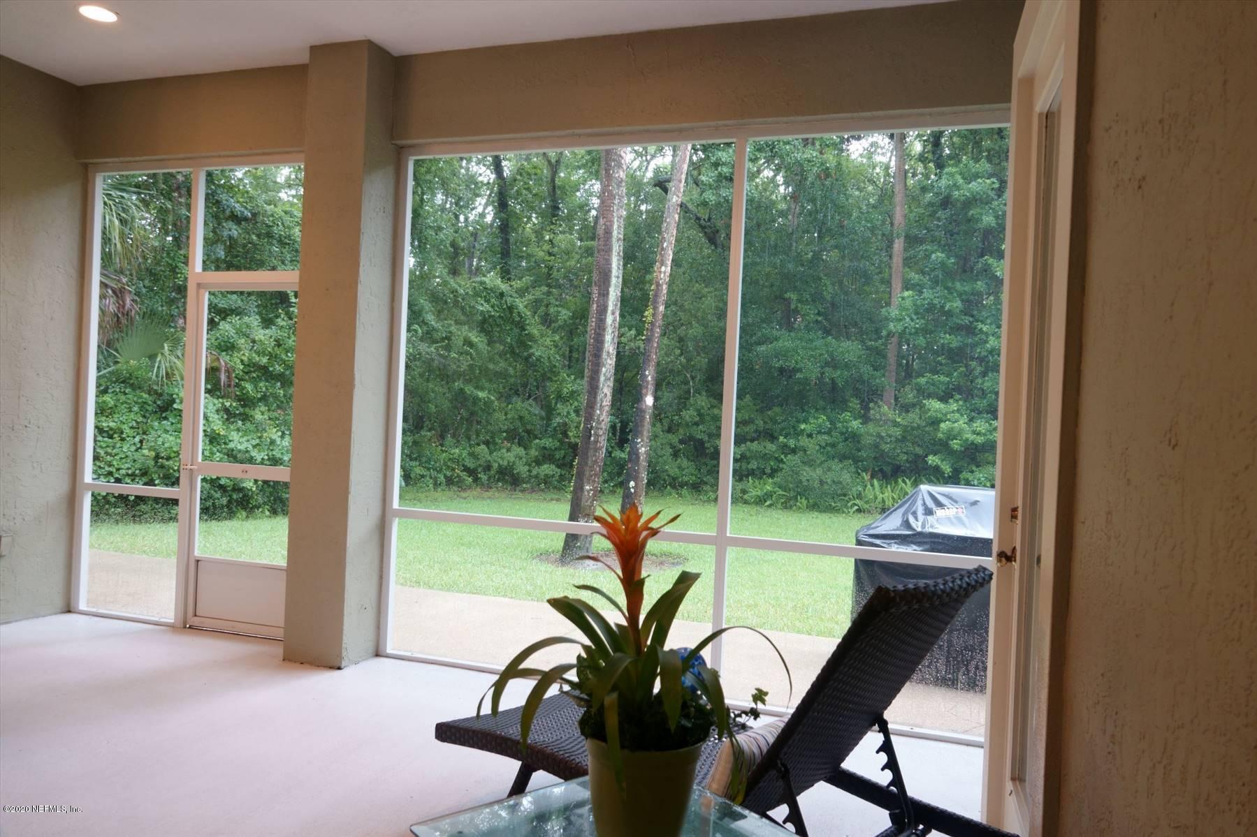 732 Mill Stream Road Ponte Vedra Beach, FL 32082 - Photo 11 of 19 a view of a porch with chairs and backyard