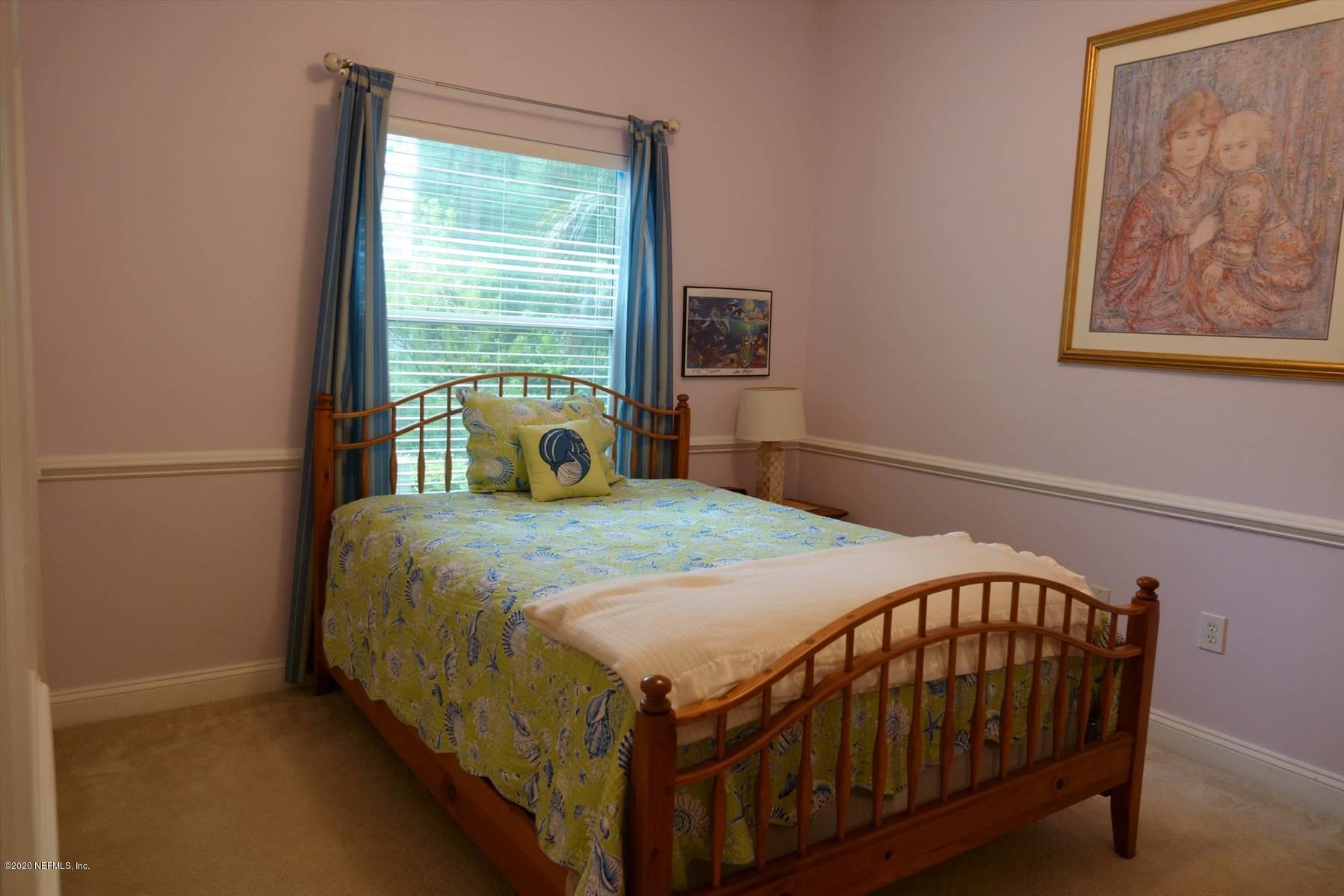 732 Mill Stream Road Ponte Vedra Beach, FL 32082 - Photo 16 of 19 a bedroom with a bed and a window