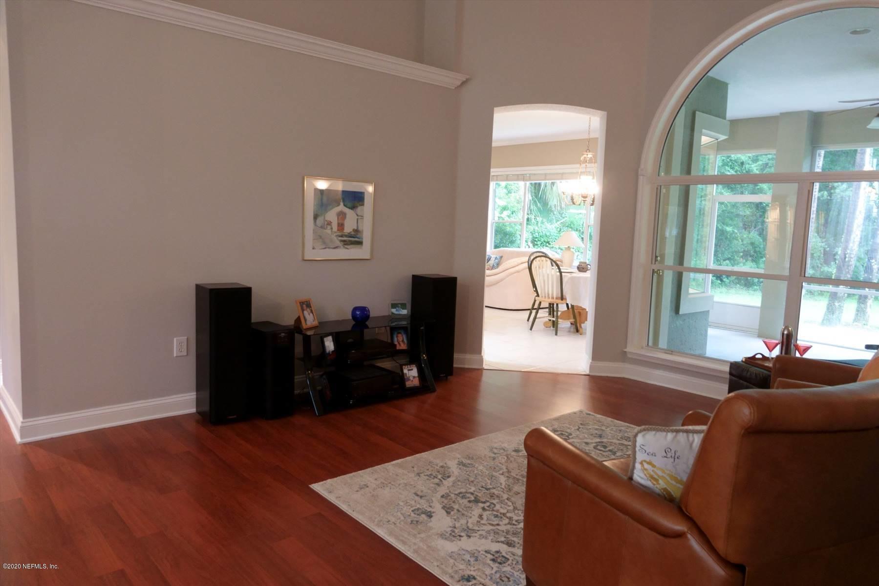 732 Mill Stream Road Ponte Vedra Beach, FL 32082 - Photo 6 of 19 a living room with furniture window and wooden floor
