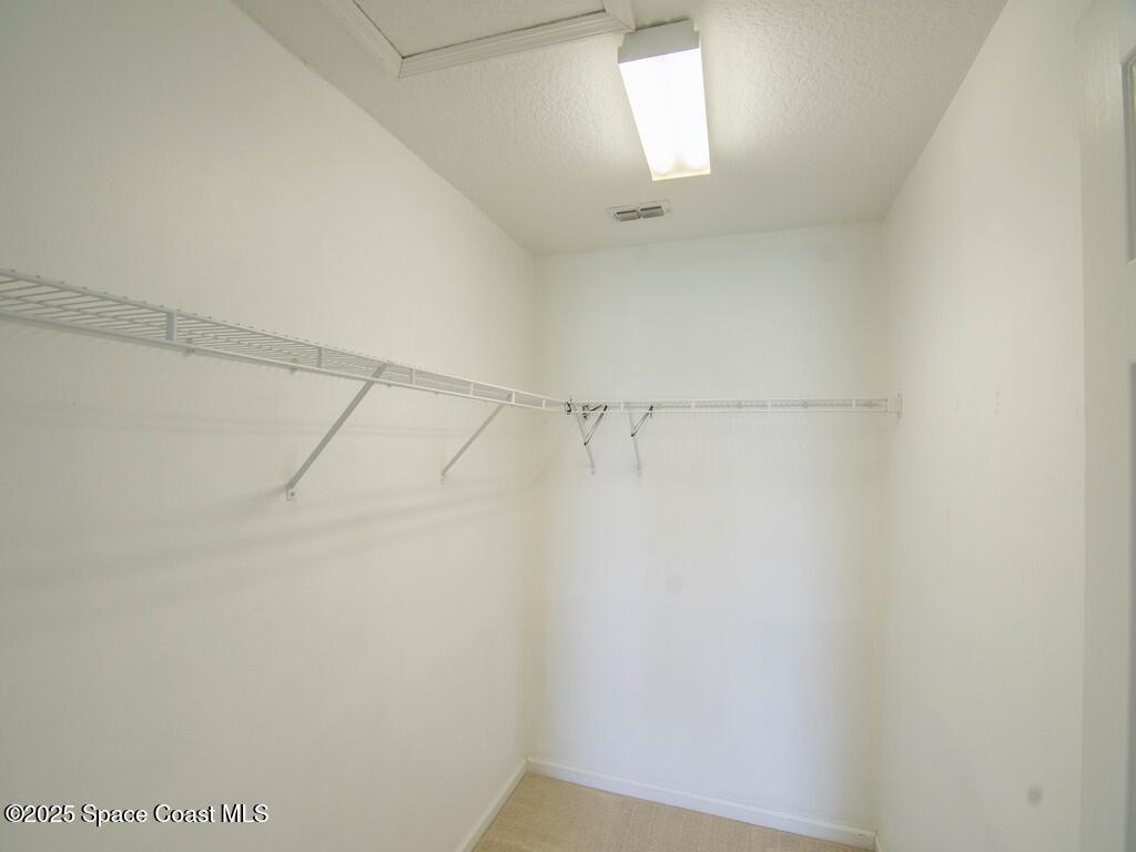 4026 Meander Place, Unit 208 Rockledge, FL 32955 - Photo 17 of 32 a view of a rack on the wall