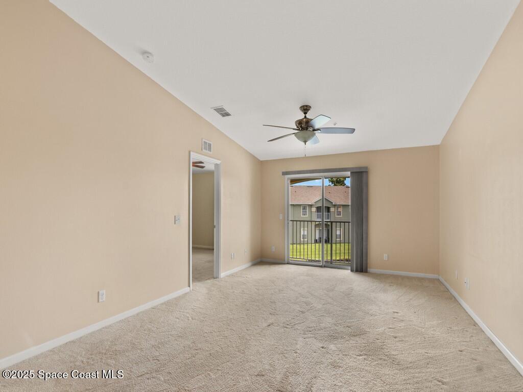 4026 Meander Place, Unit 208 Rockledge, FL 32955 - Photo 7 of 32 a view of an empty room with a window