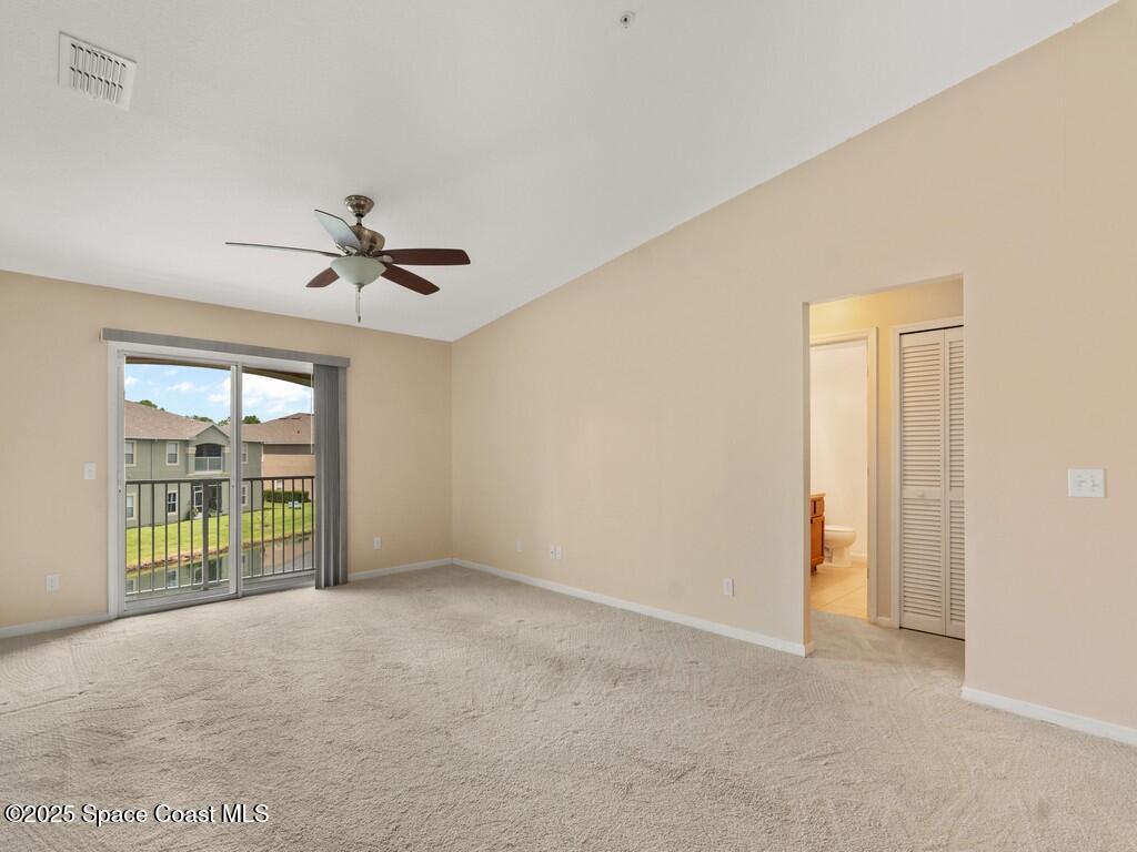 4026 Meander Place, Unit 208 Rockledge, FL 32955 - Photo 8 of 32 a view of an empty room with a window