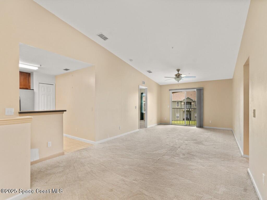 4026 Meander Place, Unit 208 Rockledge, FL 32955 - Photo 9 of 32 a view of an empty room with a window