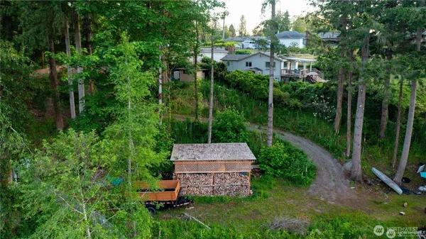 a view of a chair and table of the garden
