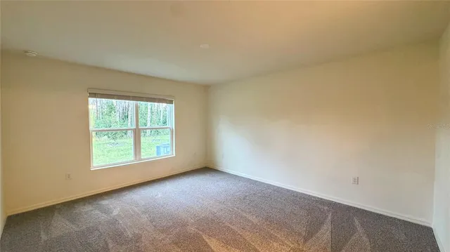 an empty room with a window