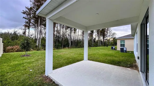 a view of a porch with a backyard