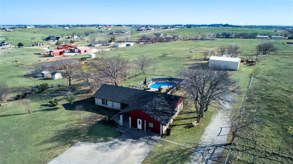 Beautiful 3 bed 2 bath home, with pool stables and 2 yr old metal building.  