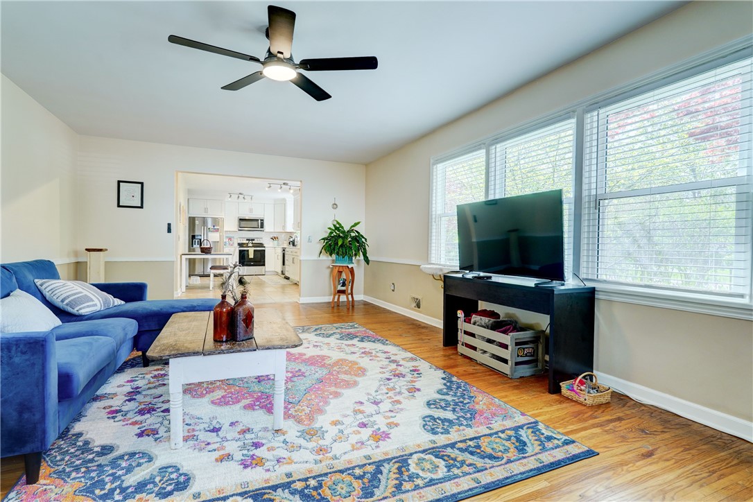 5662 Palmyra Road Pittsford, NY 14534 - Photo 12 of 44 Living room overlooks kitchen...great entertaining