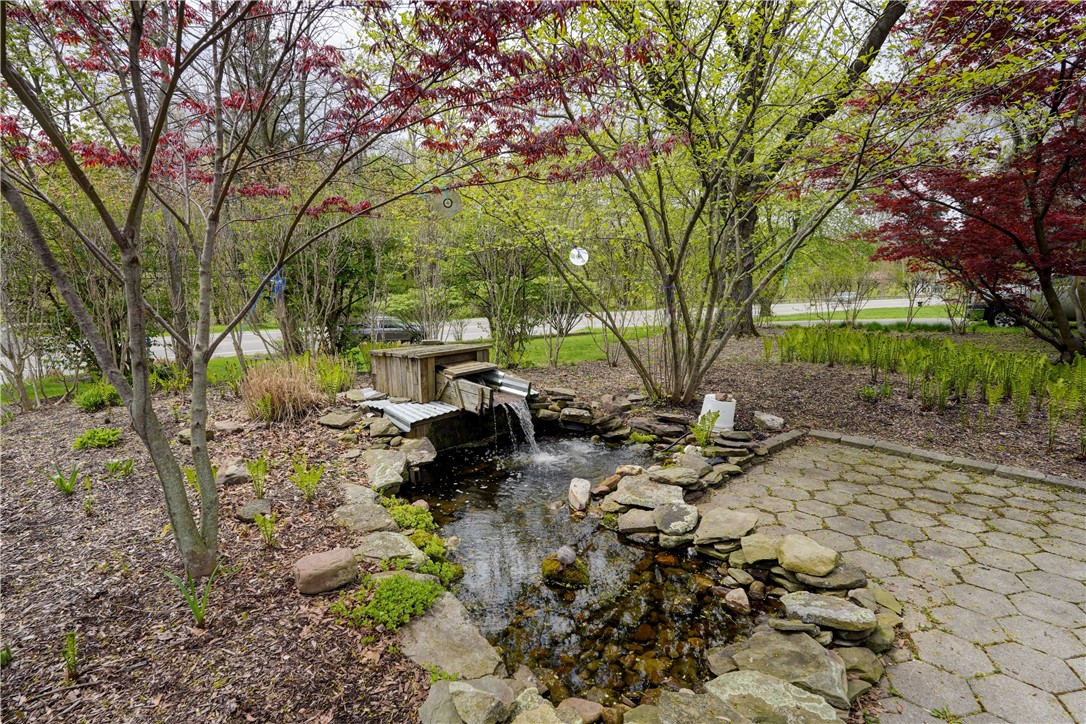 5662 Palmyra Road Pittsford, NY 14534 - Photo 2 of 44 Koi pond awaits you and your visitors