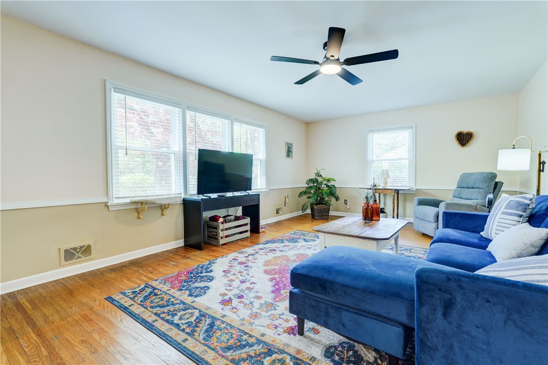 5662 Palmyra Road Pittsford, NY 14534 - Photo 10 of 44 Living room also has plenty of sunshine pouring in