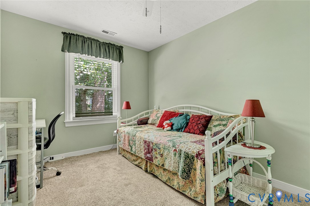 3841 Strawhill Road Richmond, VA 23231 - Photo 37 of 56 Wall-to-wall carpeting and a single window with bl