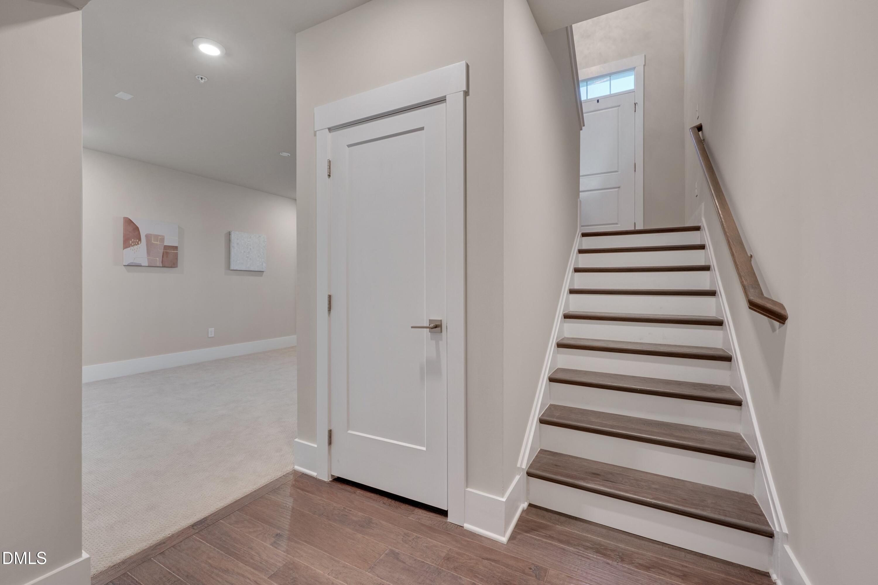 10330 Sablewood Drive, Unit 104 Raleigh, NC 27617 - Photo 22 of 39 a view of entryway with wooden floor