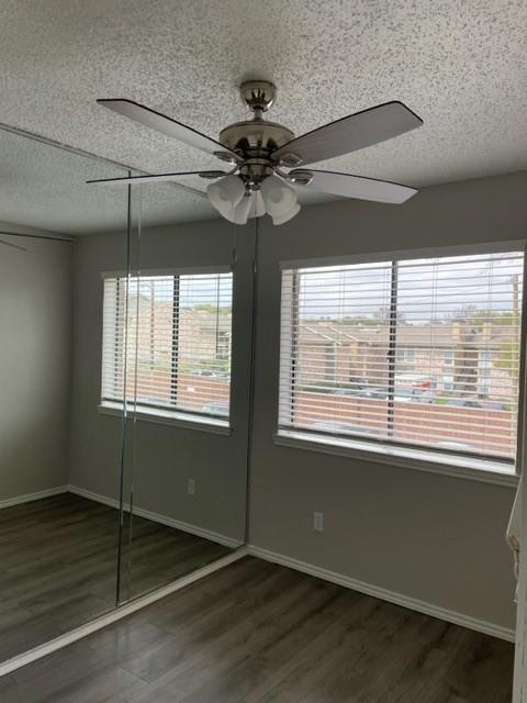 9831 West Walnut Street, Unit 206 Dallas, TX 75243 - Photo 15 of 21 a view of an empty room with a window