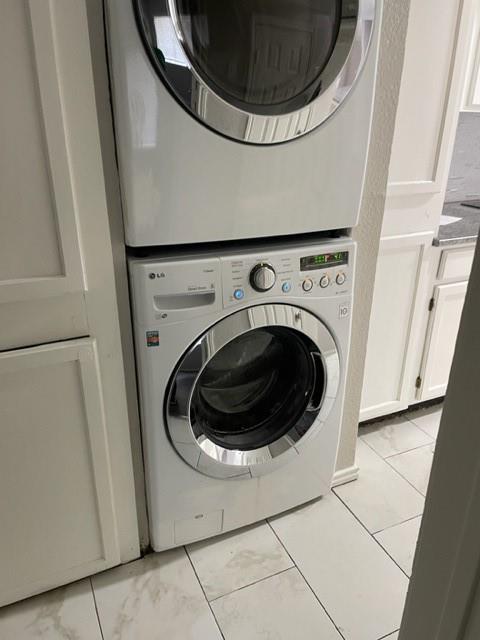 9831 West Walnut Street, Unit 206 Dallas, TX 75243 - Photo 21 of 21 a utility room with dryer and washer