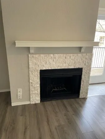 a living room with a fireplace