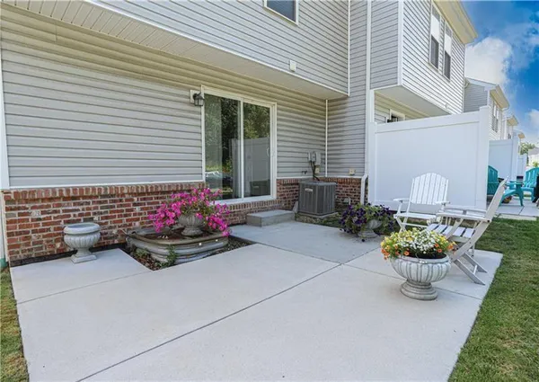a front view of a house with a patio