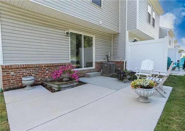a front view of a house with a patio