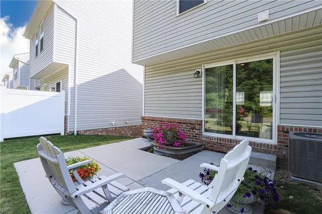 a backyard of a house with seating space