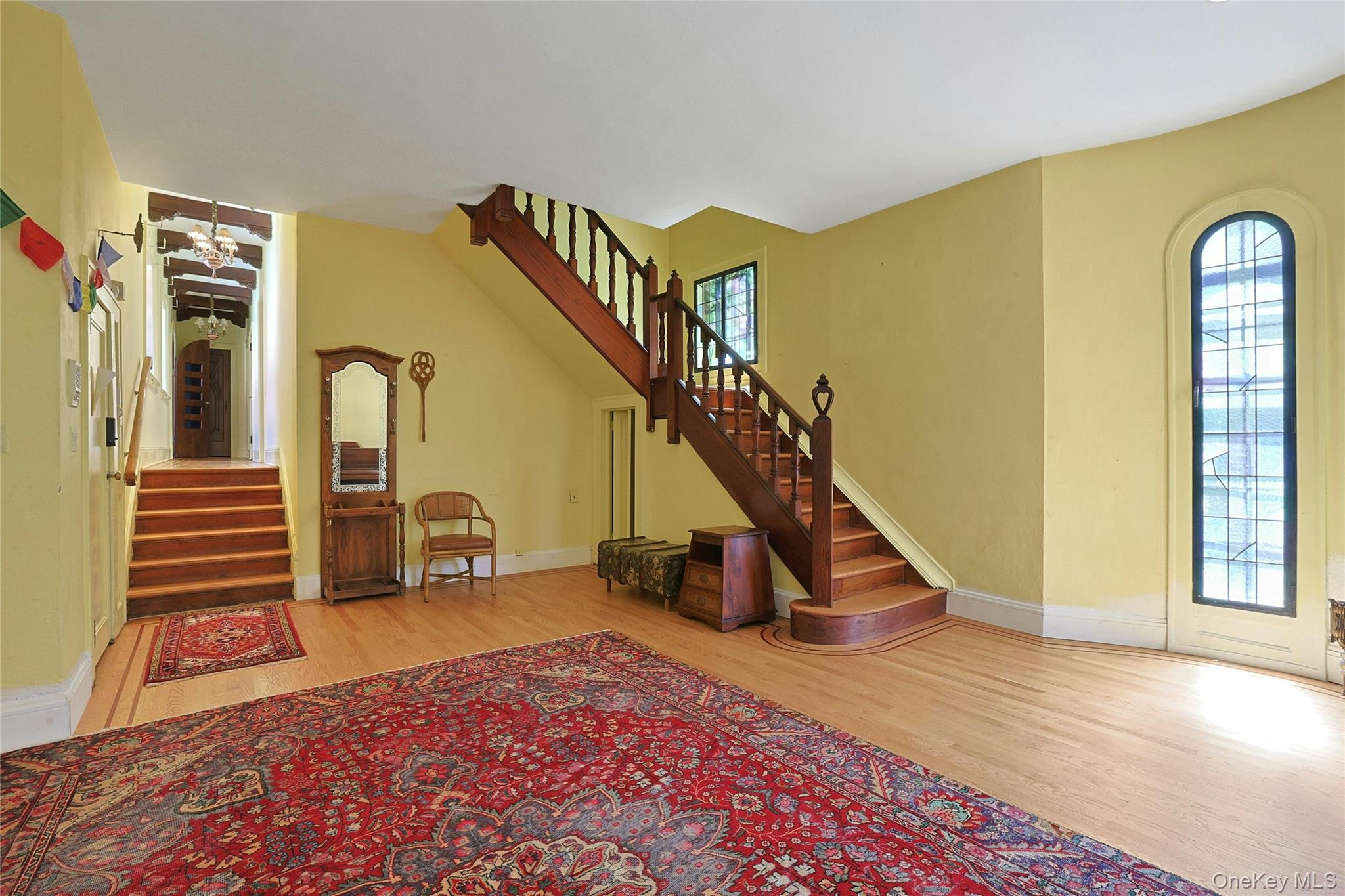 16 Lewis Road Irvington, NY 10533 - Photo 12 of 50 a view of a livingroom with wooden floor and stairs