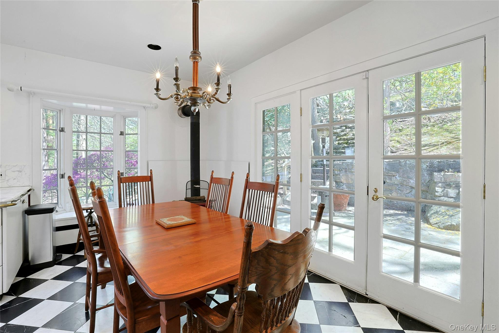 16 Lewis Road Irvington, NY 10533 - Photo 20 of 50 a view of a dining room with furniture window and outside view
