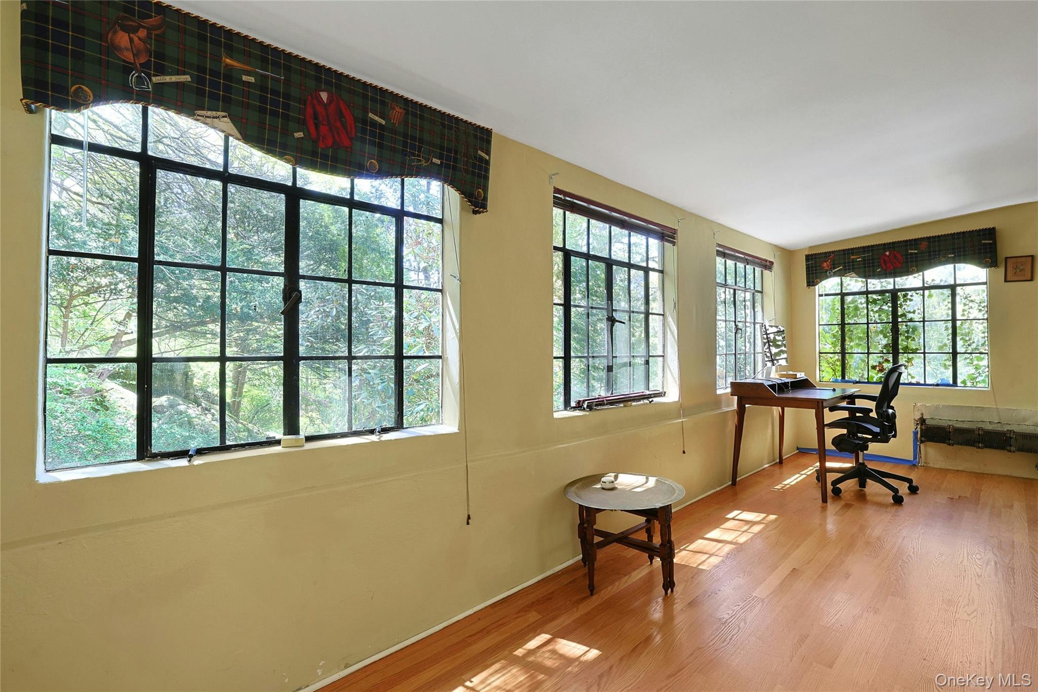 16 Lewis Road Irvington, NY 10533 - Photo 31 of 50 a living room filled with furniture and a large window