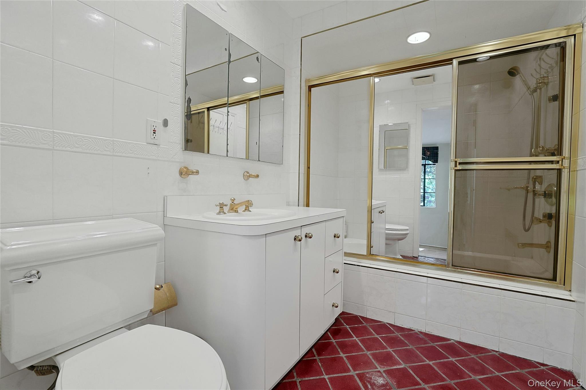 16 Lewis Road Irvington, NY 10533 - Photo 32 of 50 a bathroom with a sink toilet and shower