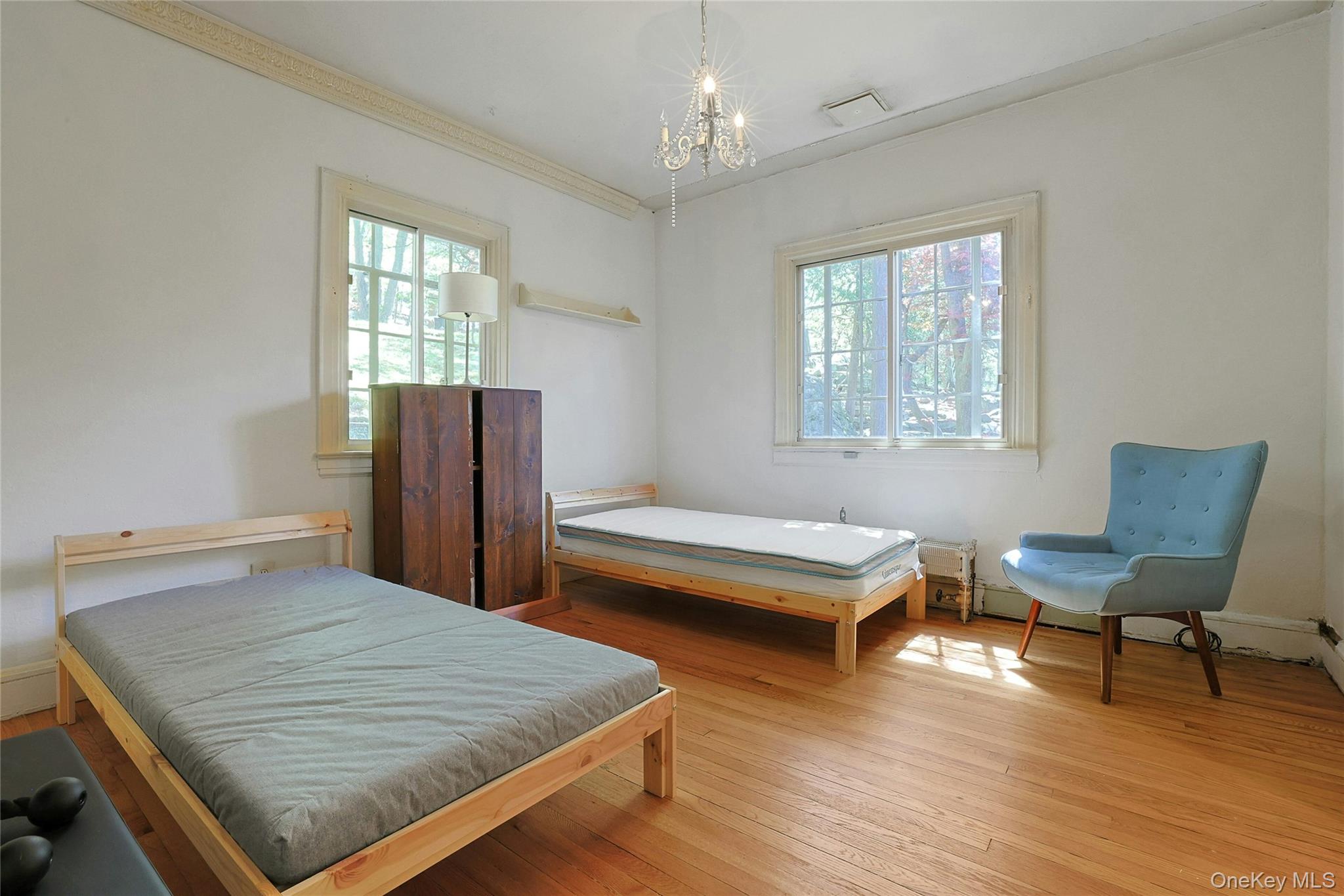 16 Lewis Road Irvington, NY 10533 - Photo 33 of 50 a bedroom with a bed and window