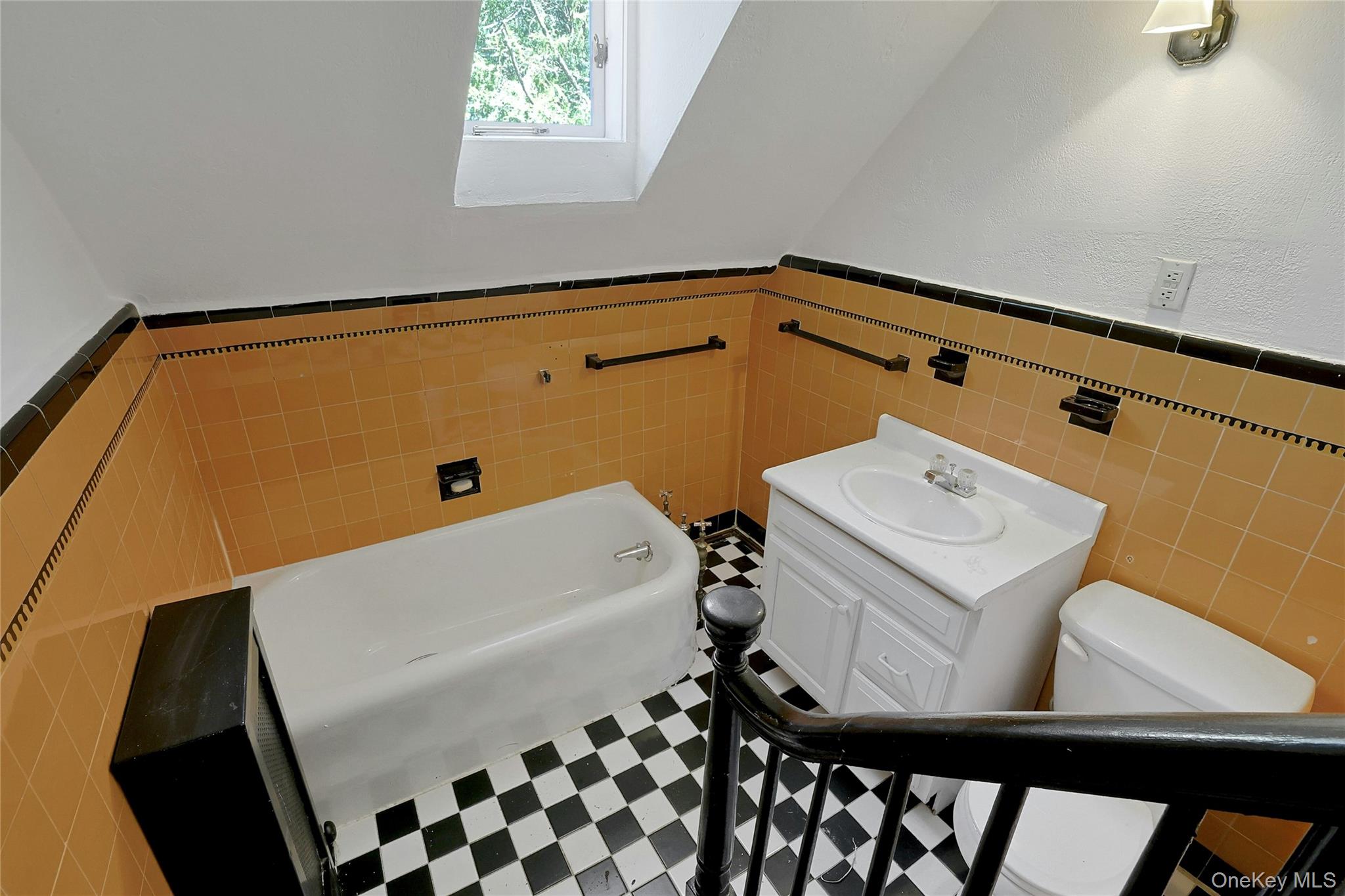 16 Lewis Road Irvington, NY 10533 - Photo 39 of 50 a bathroom with a sink and a mirror