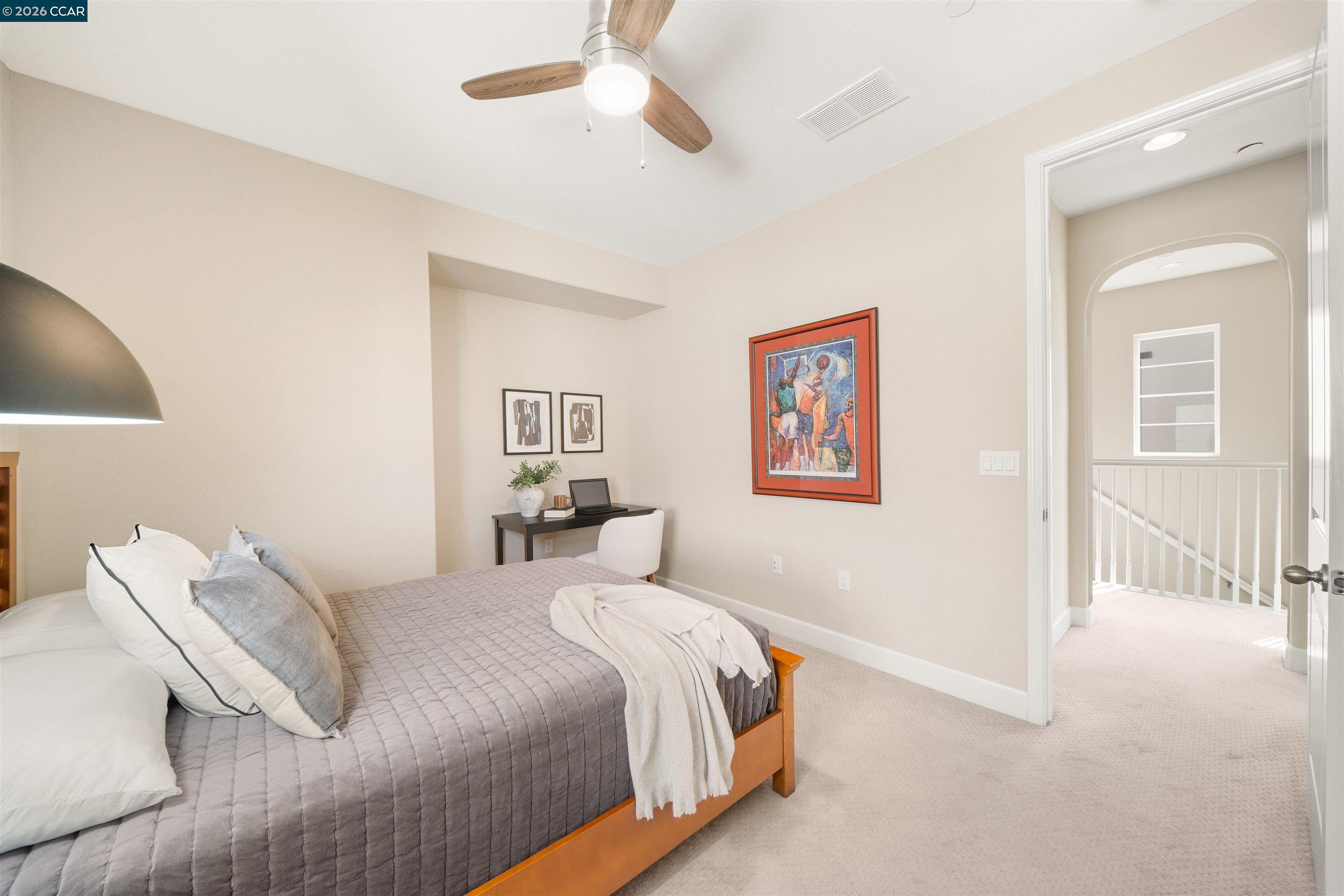 2026 Poinsettia Street San Ramon, CA 94582 - Photo 18 of 26 a bedroom with a bed and a chandelier