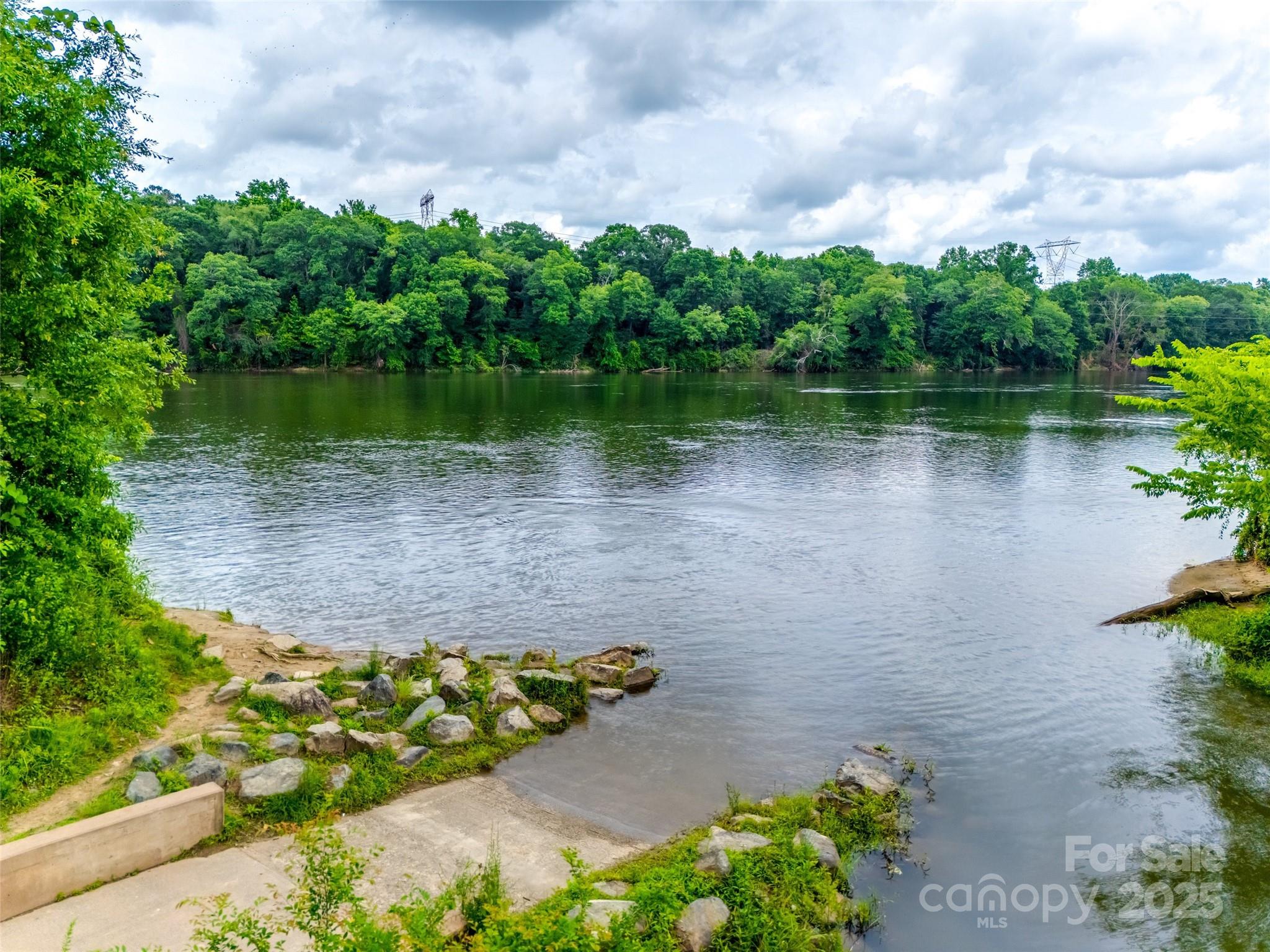 280 Auburn View Road Rock Hill, SC 29730 - Photo 39 of 48 a view of a lake with a yard and large trees