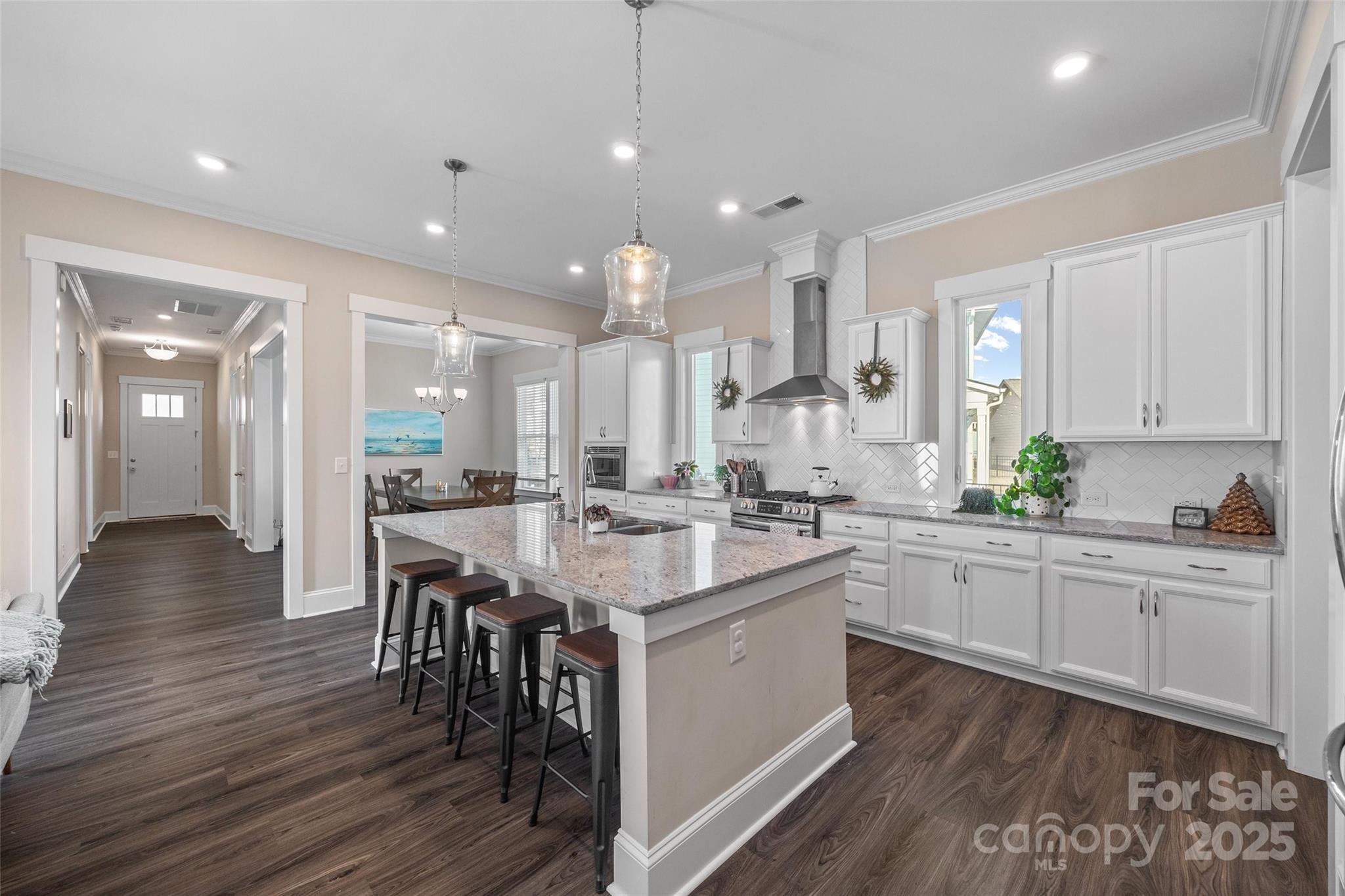 280 Auburn View Road Rock Hill, SC 29730 - Photo 9 of 48 a large kitchen with cabinets chairs and wooden floor