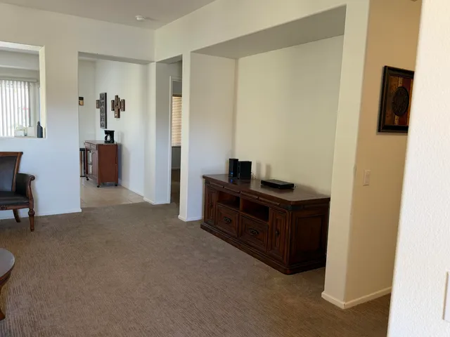 a room with furniture and a window