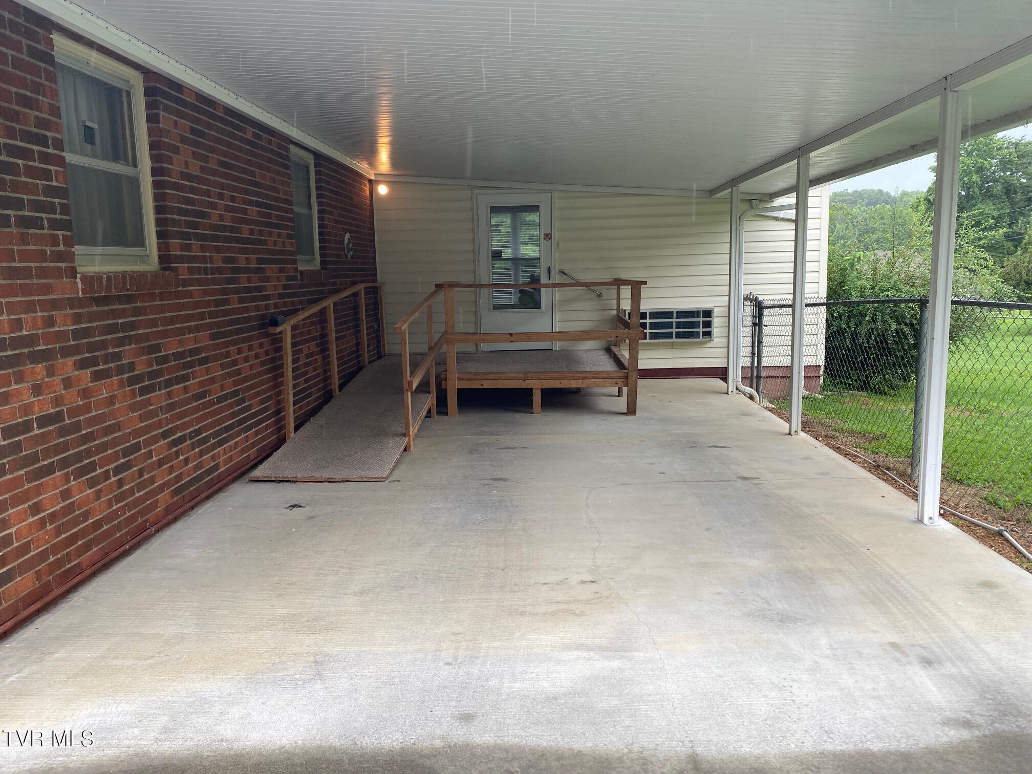 3204 Marbleton Road Unicoi, TN 37692 - Photo 16 of 114 Carport with ramp and deck