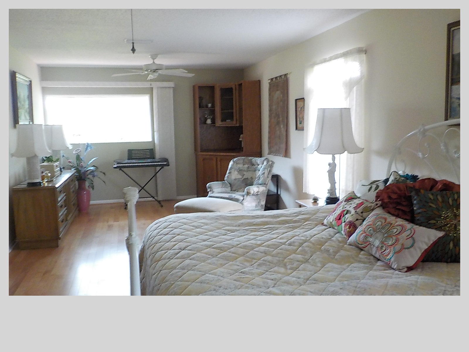 2159 Southeast Erwin Road Port St. Lucie, FL 34952 - Photo 15 of 48 a bedroom with a bed and window