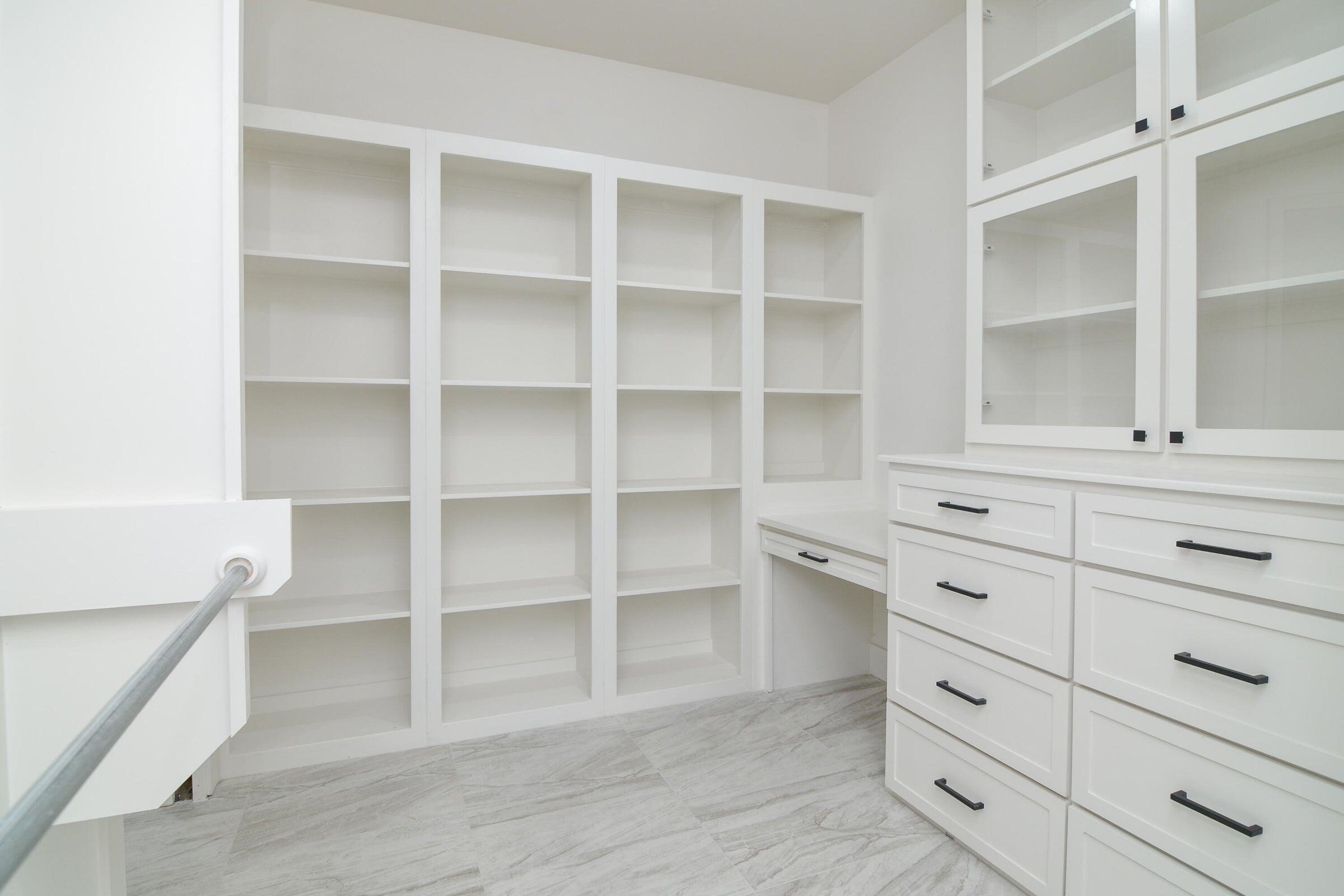 7801 56th Street Lubbock, TX 79407 - Photo 14 of 29 a view of an empty walk in closet