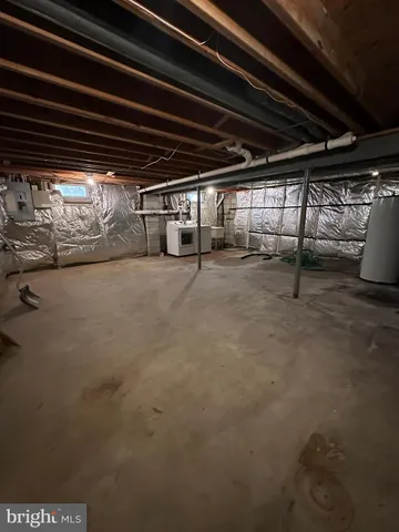 a view of an empty room with storage