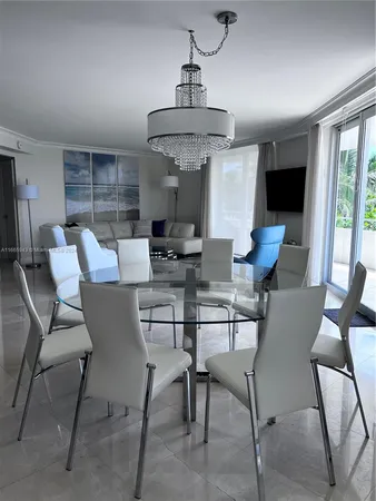 a view of a room with baby toys and wooden floor
