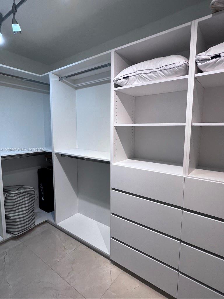 5161 Collins Avenue, Unit 505 Miami Beach, FL 33140 - Photo 26 of 31 a utility room with closet