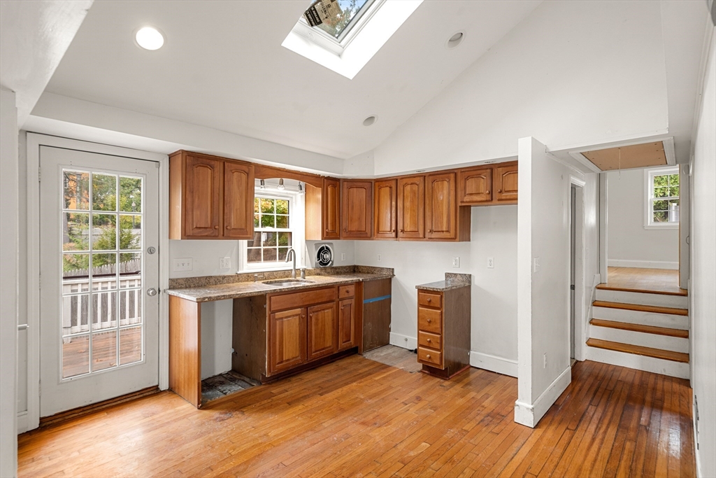 27 Columbia Road Marblehead, MA 01945 - Photo 10 of 30 a kitchen with stainless steel appliances granite countertop a stove and a refrigerator