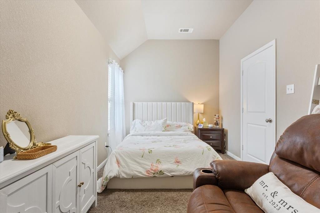 10205 Mickler Lane Waco, TX 76708 - Photo 19 of 35 a bedroom with a bed and closet