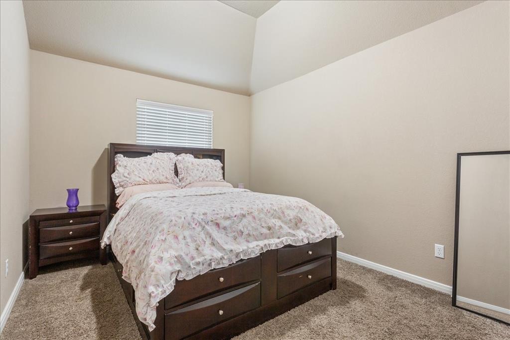 10205 Mickler Lane Waco, TX 76708 - Photo 20 of 35 a bedroom with a bed and a closet