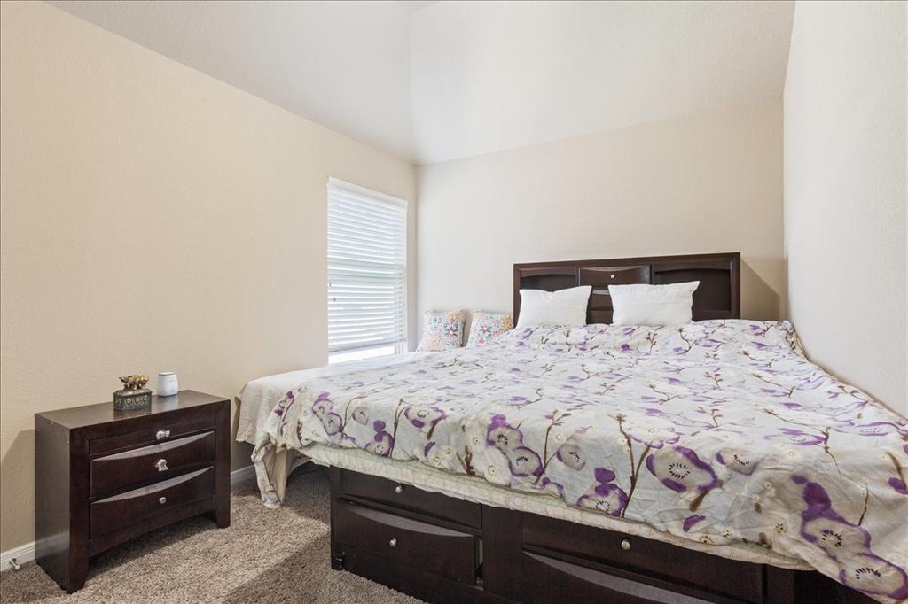 10205 Mickler Lane Waco, TX 76708 - Photo 21 of 35 a bedroom with a bed and a window