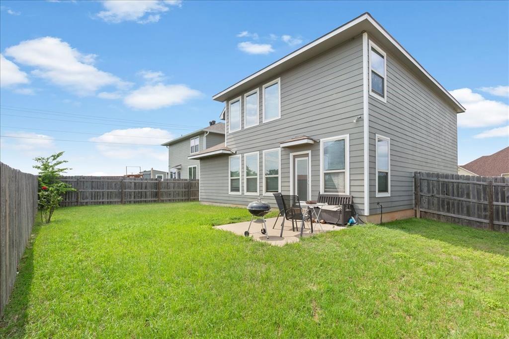10205 Mickler Lane Waco, TX 76708 - Photo 28 of 35 a front view of house with yard and seating area