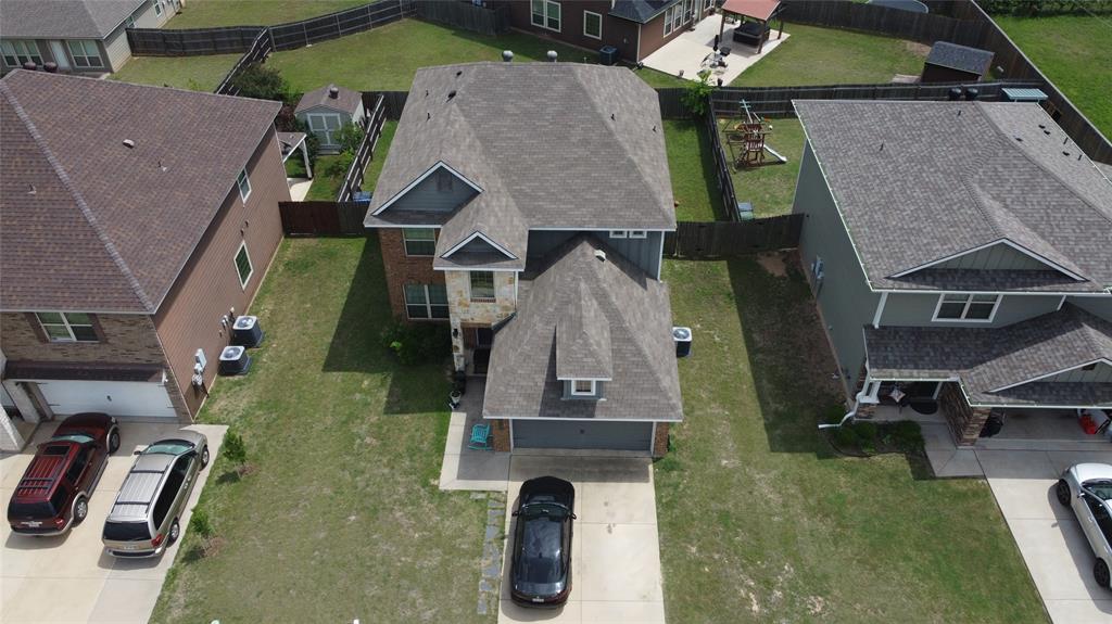 10205 Mickler Lane Waco, TX 76708 - Photo 31 of 35 an aerial view of houses with a yard