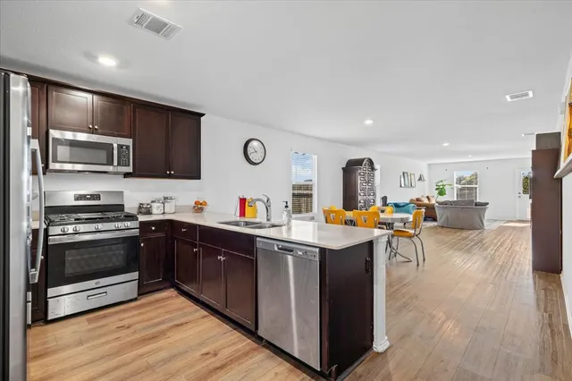 a black and white photo of a living room