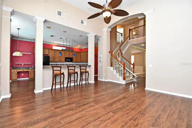 a kitchen with stainless steel appliances granite countertop a stove and a sink