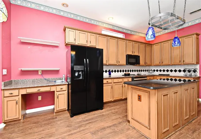 a utility room with a sink dryer and washer