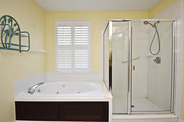 a backyard of a house with outdoor seating