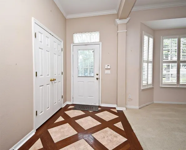 a view of a room with a large window