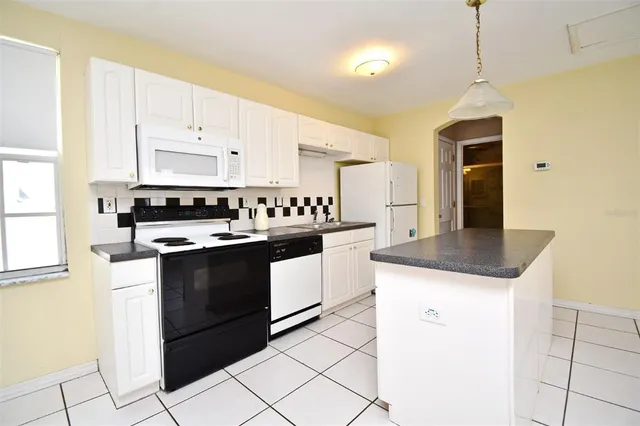 a front view of a building with street view